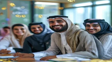 A diverse group of Saudi teachers smiling and collaborating in a modern classroom setting