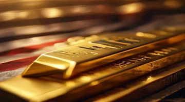 Close-up shot of a gold bar with an Egyptian flag subtly blurred in the background represe