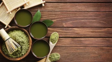 Vibrant green tea cup fresh green tea leaves healthy lifestyle glowing skin natural detox